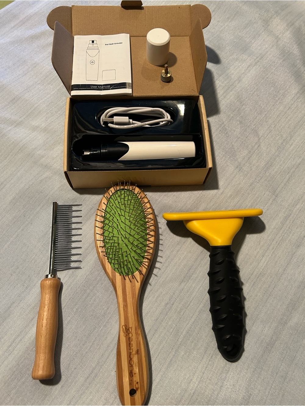 Complete grooming kit for dogs with FURminator, comb and brush plus nail dremmel